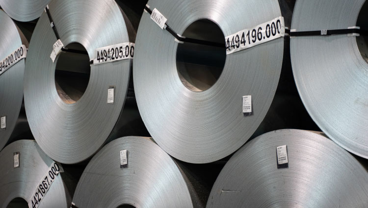 Image of stacked Nucor Steel rolls